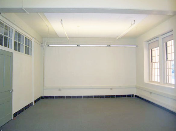 Image of interior of office with two windows.