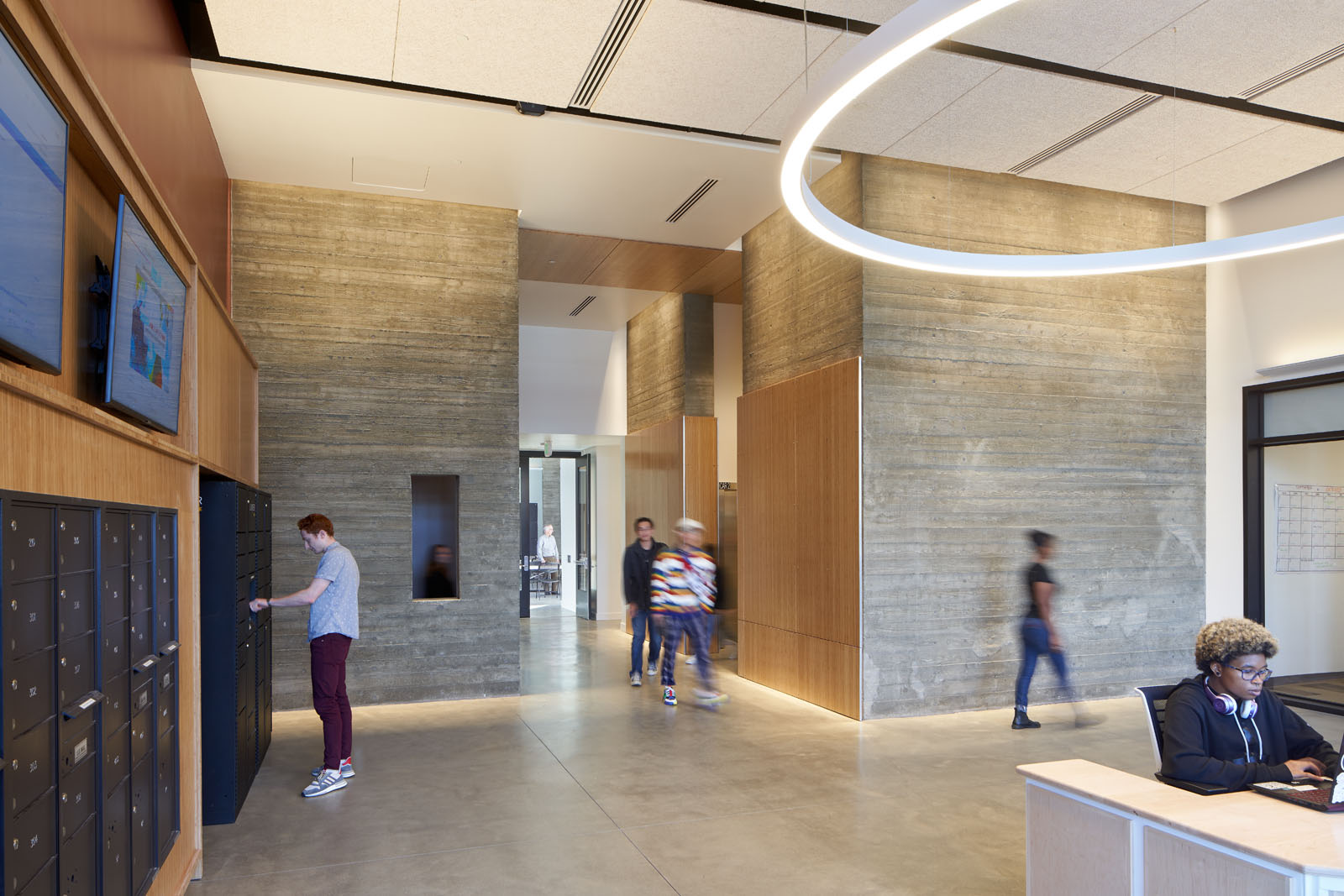 Lobby area showing students walking through