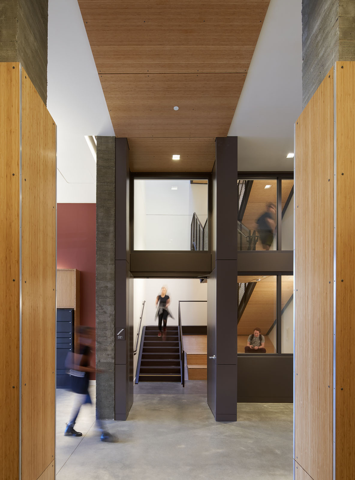 Lobby area showing students walking through corridor.