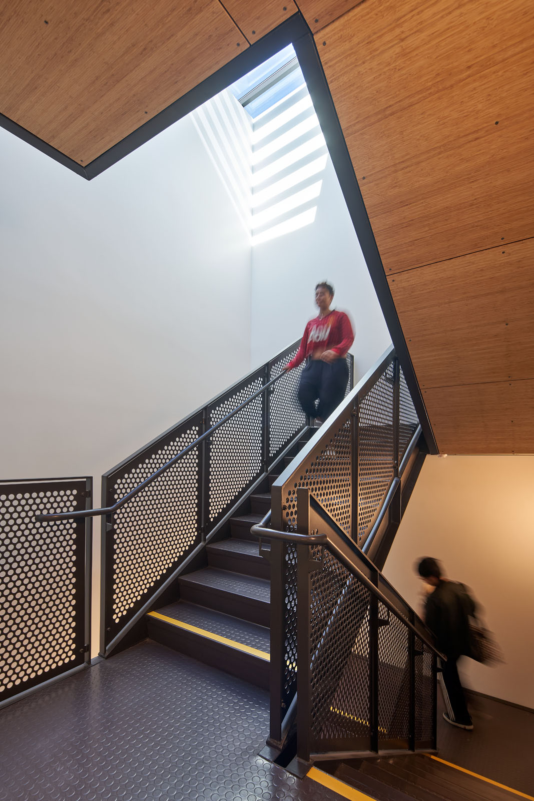 Stairway showing students walking coming down stairs