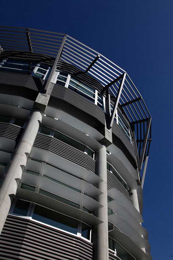 Close up daytime exterior view of architectural details of building corner and overhangs