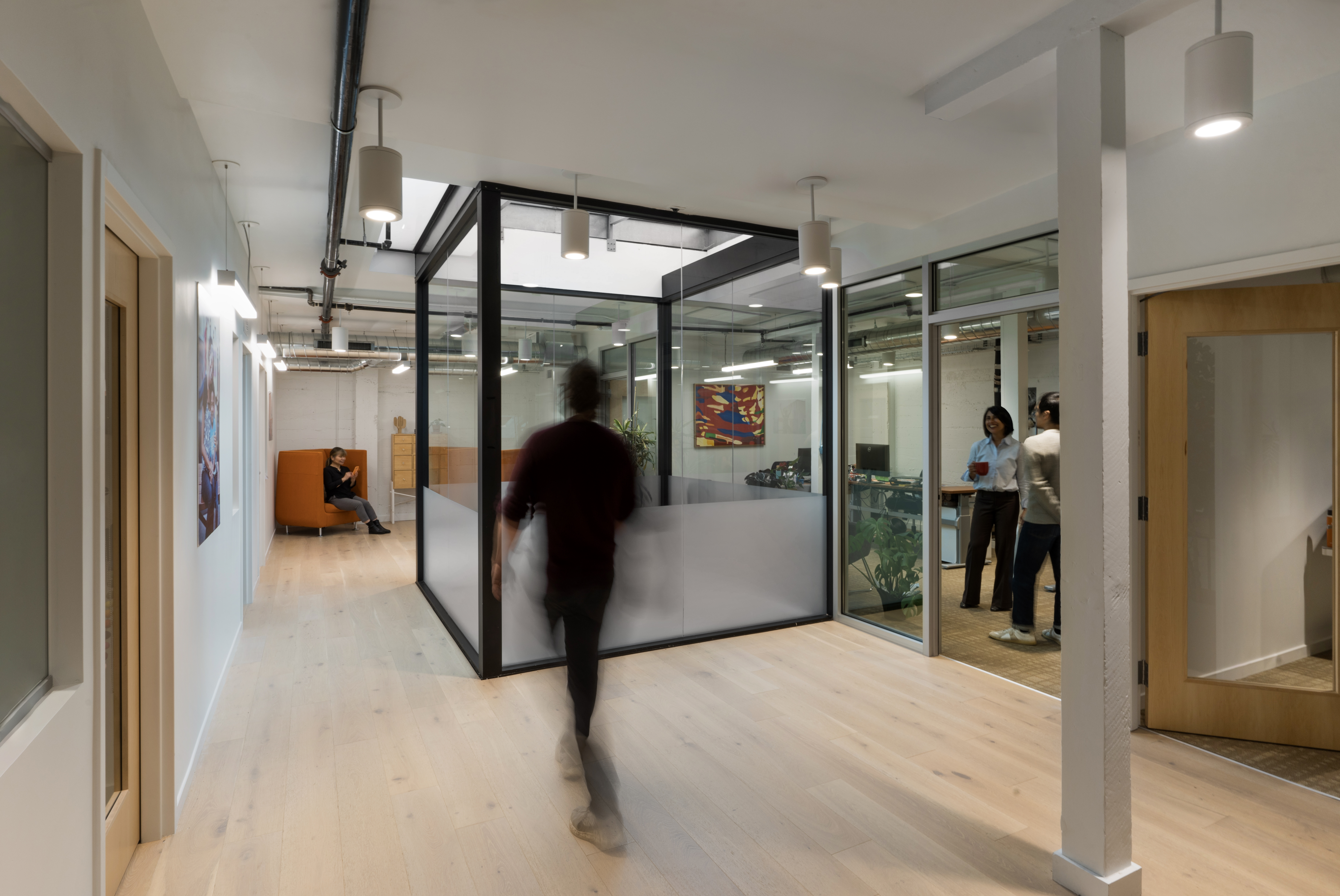 common area with staff walking through