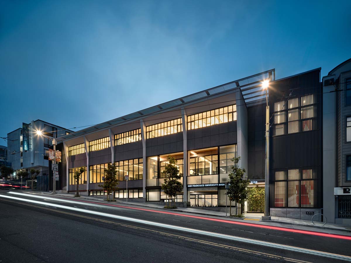 Exterior facade street view of 3150 California Street at dusk.