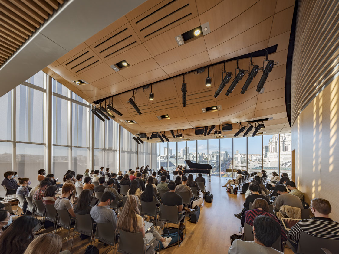 Image of audience in concert hall with view of Van Ness Ave