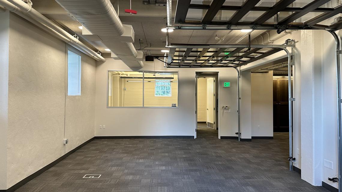Photo of interior office space unfurnished facing private office