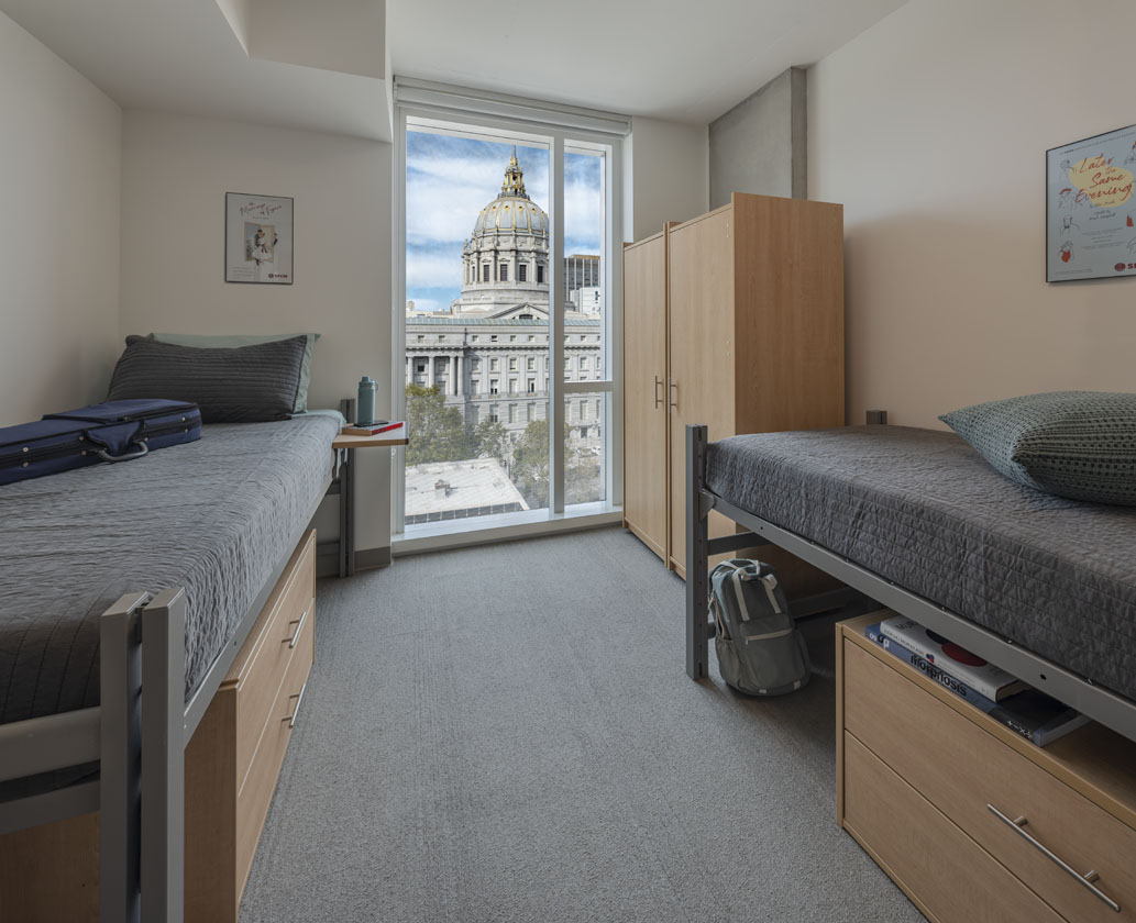 Student apartment with two beds and view of City Hall